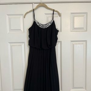 Ellicott long black dress with rhinestone embellishment.